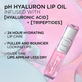 L'Oreal Paris lip oil next to a coin for size and scale and easy-to-carry benefit