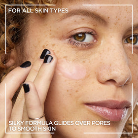 L'Oreal Paris primer applied to cheek showing smoothing effect for longer makeup wear