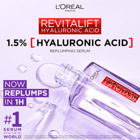L'Oreal Paris close-up of dropper and clear serum texture emphasizing fast absorption