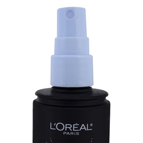 L'Oreal Paris spray in use on model locks makeup for all-day wear