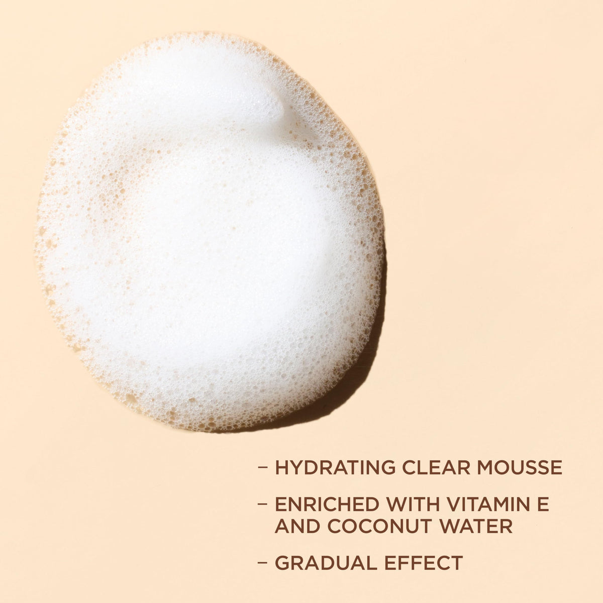 L'Oreal Paris mousse dispensed on hand highlighting lightweight feel