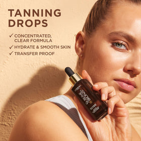L'Oreal Paris drops mixed into moisturizer demonstrating easy application