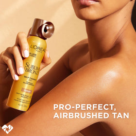 L'Oreal Paris mist sprayed on forearm illustrating smooth, streak-free coverage