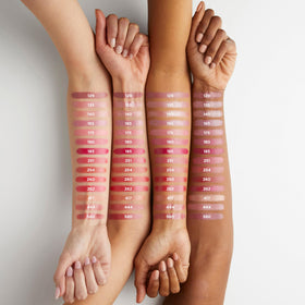 L'Oreal Paris Tropical Coral texture swatch on skin showing smooth glide and true shade