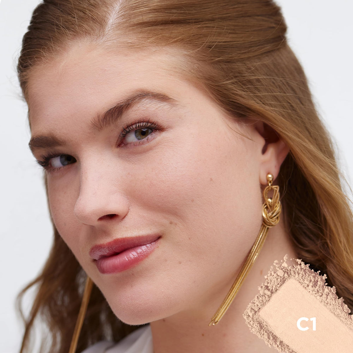 L'Oreal Paris powder texture close-up showing micro-fine finish that blends smoothly