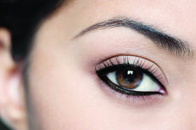 L'Oreal Paris texture swatches showing deep black payoff and blendability benefit