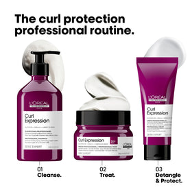 Applying L'Oréal Professionnel Paris mousse to curly hair to define curls and reduce frizz