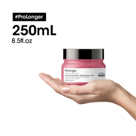 L'Oréal Professionnel Paris product in hand during application for targeted benefit