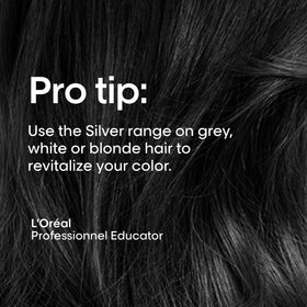 L'Oréal Professionnel shampoo being applied to wet hair for neutralizing brass