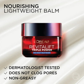 L'Oreal Paris cream on fingers showing easy application and smooth spread