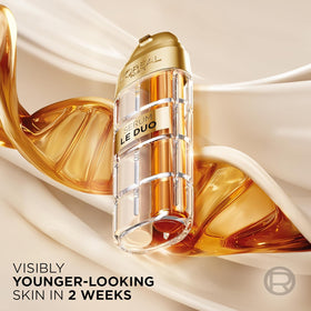 L'Oreal Paris bottle beside sample showing product size and starter inclusion for testing