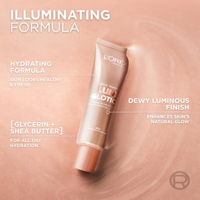 L'Oreal Paris model applying product to cheek for natural highlight