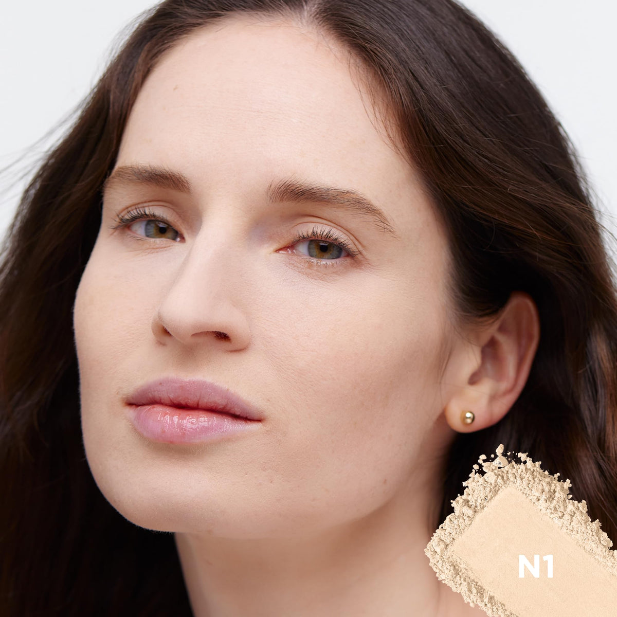 L'Oreal Paris True Match powder texture close-up showing finely milled, blendable finish