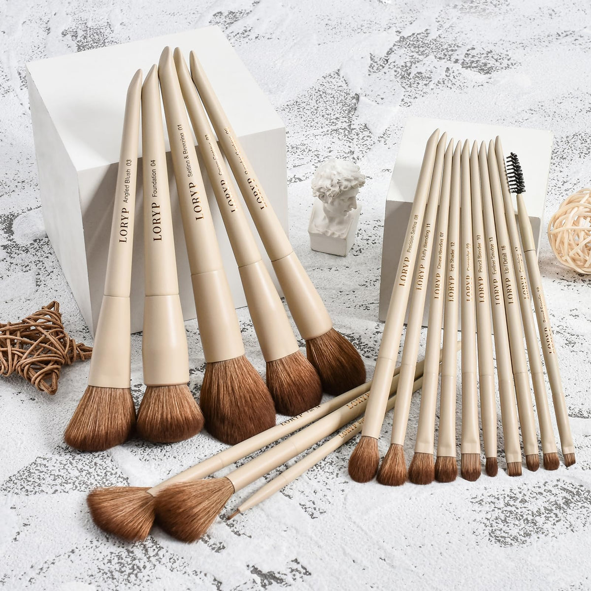 LORYP brushes held in hand to show scale and comfortable length