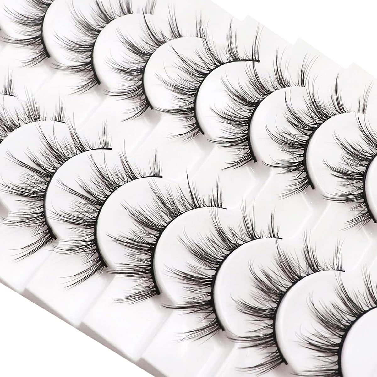 Losha lashes on vanity with applicator illustrating everyday styling convenience and portability