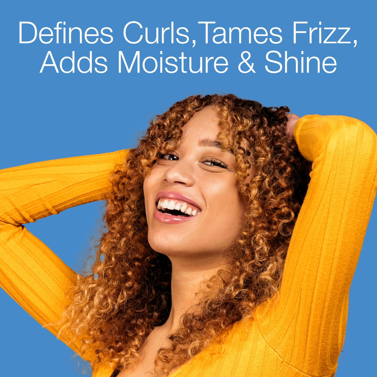 Lottabody cream applied to damp curls demonstrating smooth application and detangling