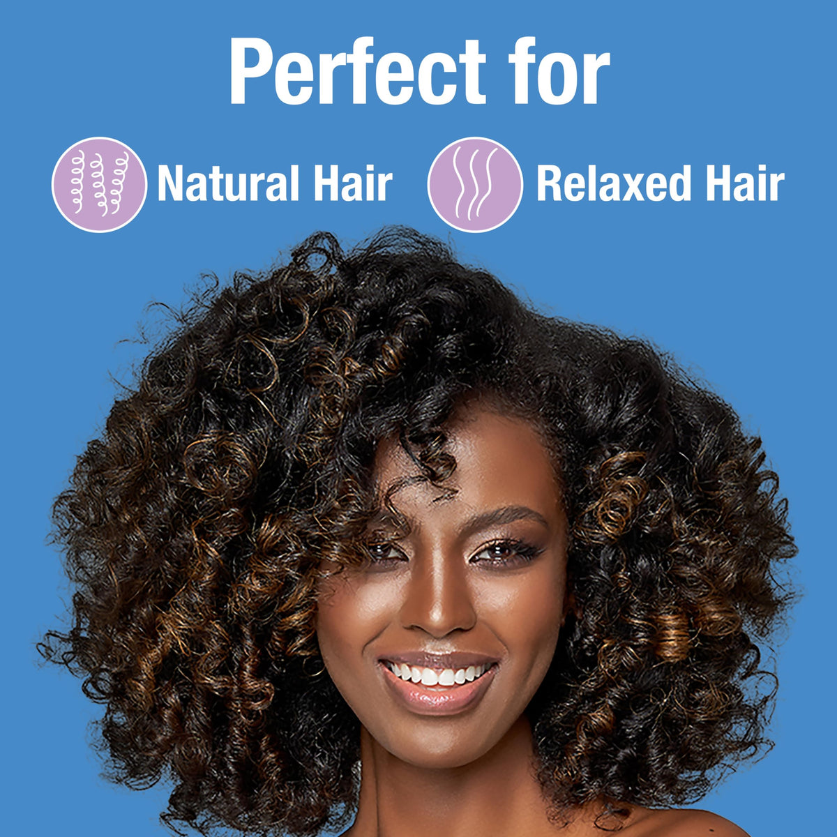 Applying Lottabody spray to damp hair for detangling and prep