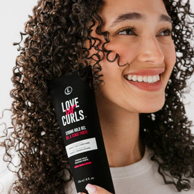 Love Ur Curls gel applied to soaking wet hair for even distribution and hold