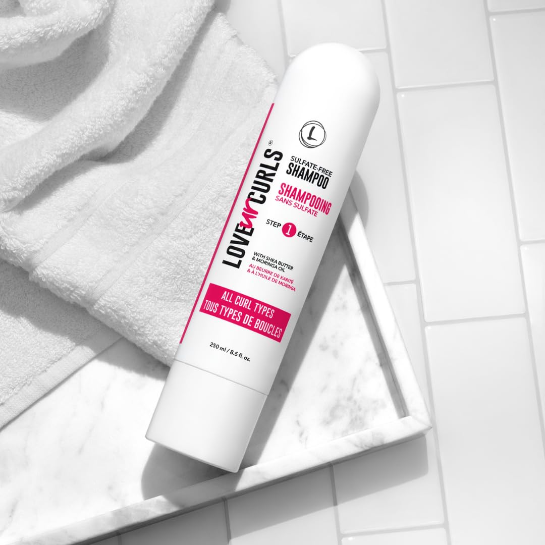 Love Ur Curls 8.5 oz bottle next to common item showing compact travel-friendly size