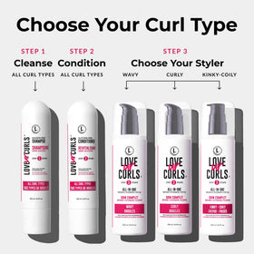 Love Ur Curls bottles next to hand to show product scale and convenient size