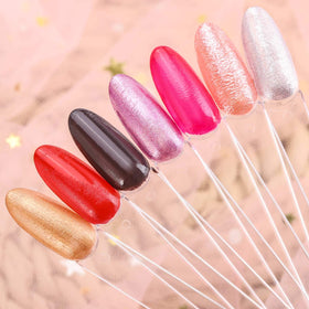 LoveBB hand holding metal-ringed swatches demonstrating portability and client presentation