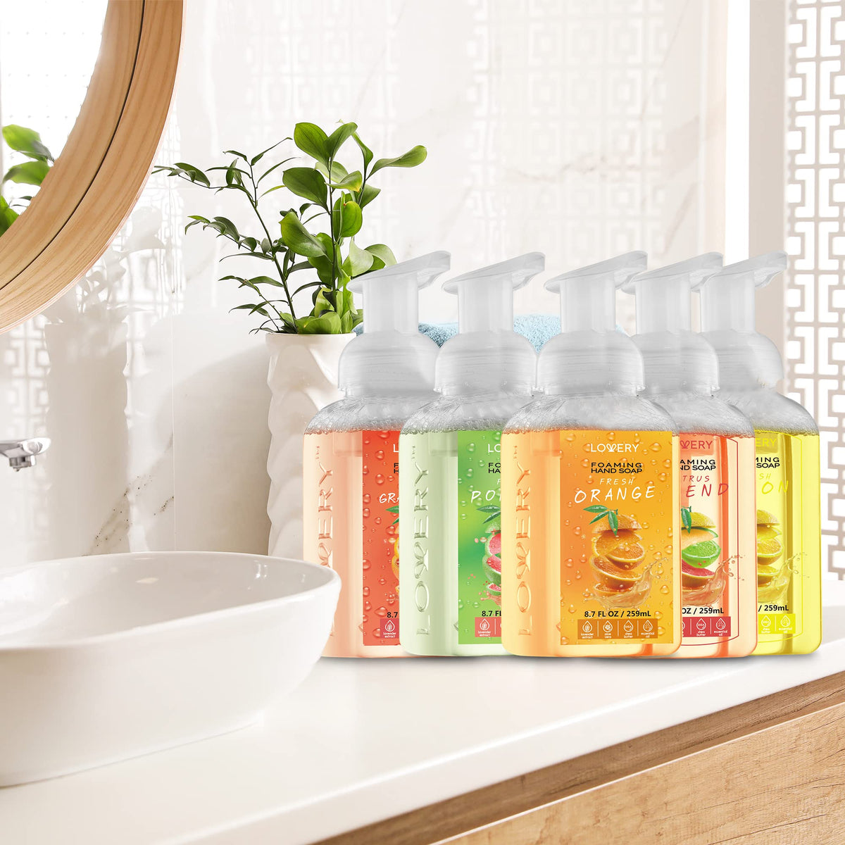 Lovery bottle beside common items to show size and scale for countertop fit