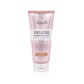 Loving Tan front packaging showing medium gradual tan bottle and benefits