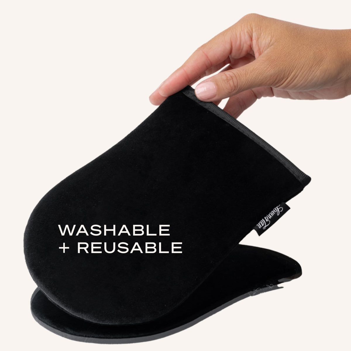 Applying self tan with Loving Tan mitt on leg for streak-free, salon-style finish