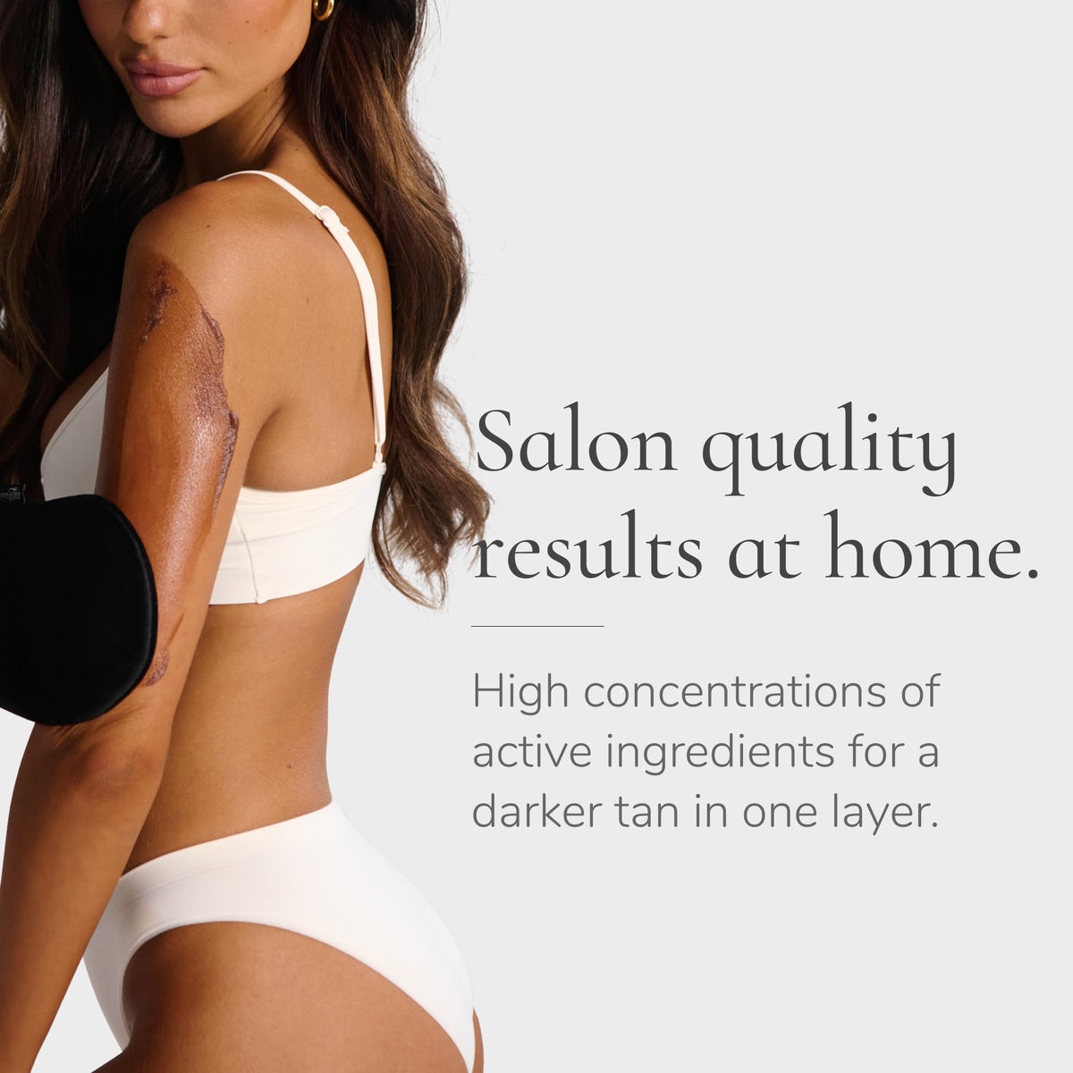 Loving Tan mousse displayed on bathroom shelf in lifestyle setting for at-home salon convenience