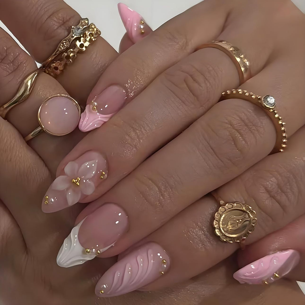 LPOODDNU close-up of almond-shaped nail tips highlighting salon finish