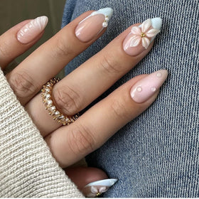 LPOODDNU front packaging showing 24pcs almond flower pearl nails and clear benefit of variety