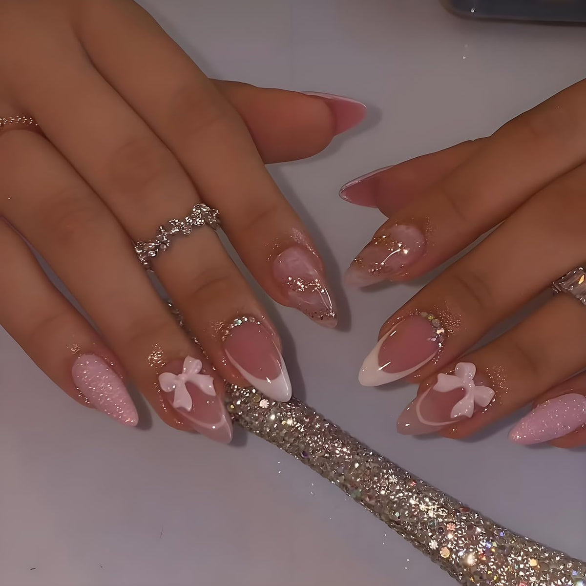 LPOODDNU front packaging showing 24-piece almond press-on nails kit, quick salon look