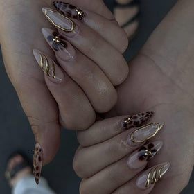 LPOODDNU front packaging showing 24-piece brown leopard press-on nails and included tabs
