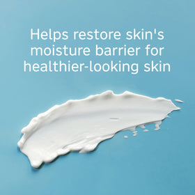 Using Lubriderm on face to demonstrate gentle, non-comedogenic hydration