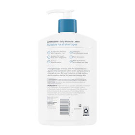 Lubriderm bottle held in hand showing true size and travel-friendly scale