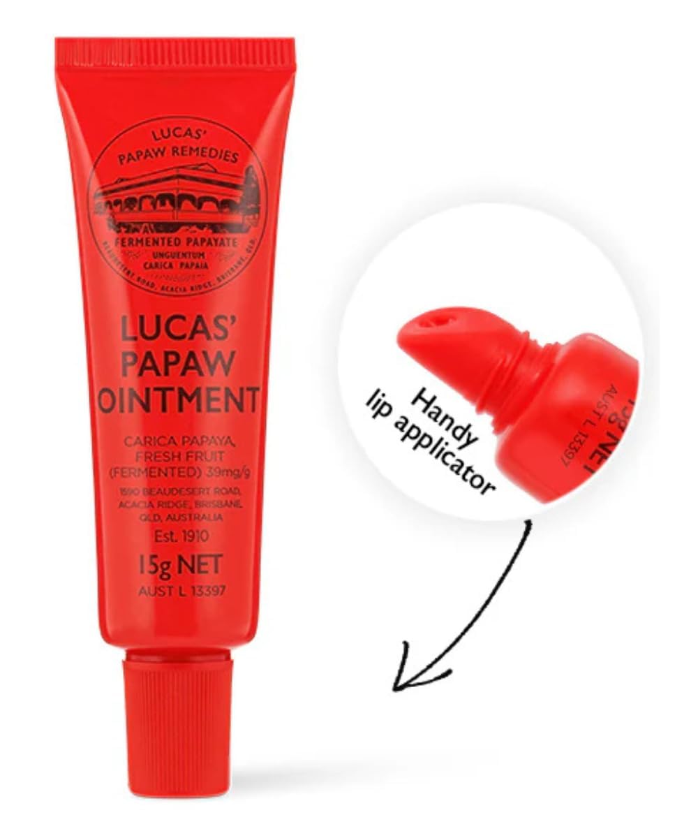Dollop of Lucas Papaw ointment on palm highlighting smooth texture and conditioning benefit