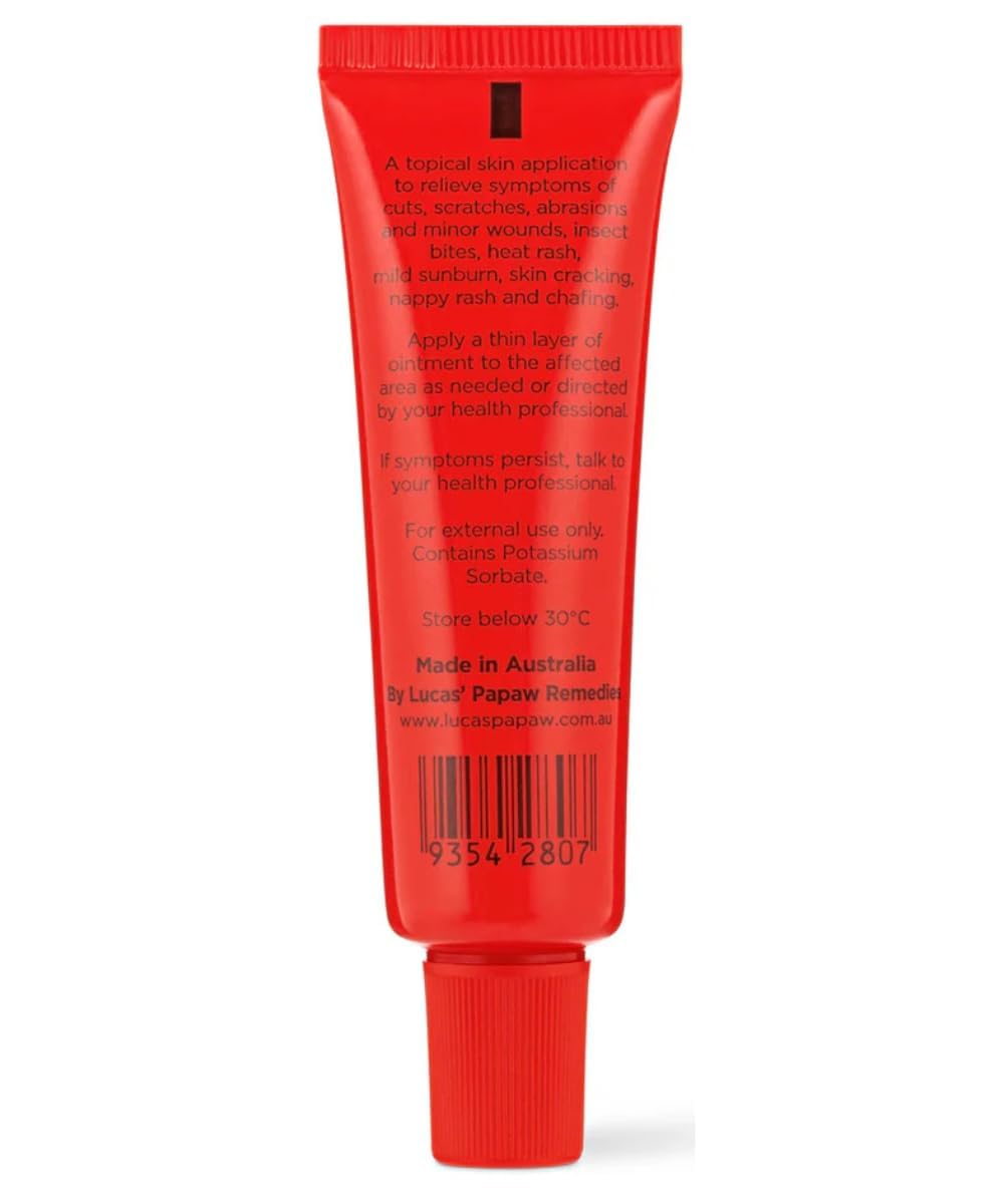 Lucas Papaw 15g tube held in hand to show pocket-size portability benefit