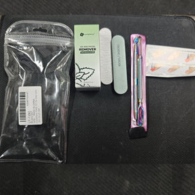 Luckyfairy kit next to coin for scale showing compact size and portability