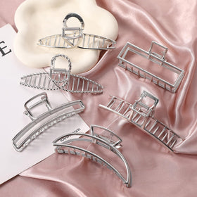 LUKACY worn in an elegant updo conveying secure hold and versatile style