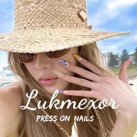 Lukmexor lifestyle shot at a picnic highlighting festive manicure for events