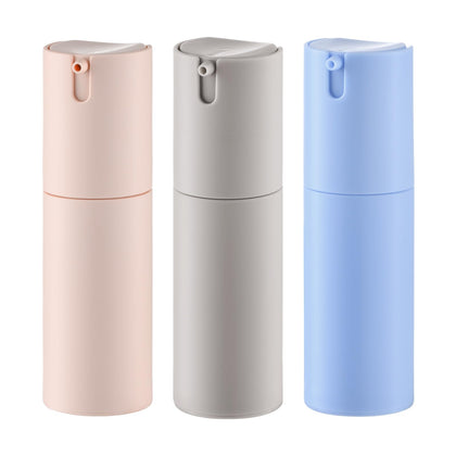 Lulupack front view of three 1 oz airless pump bottles showing colors and caps, travel convenience