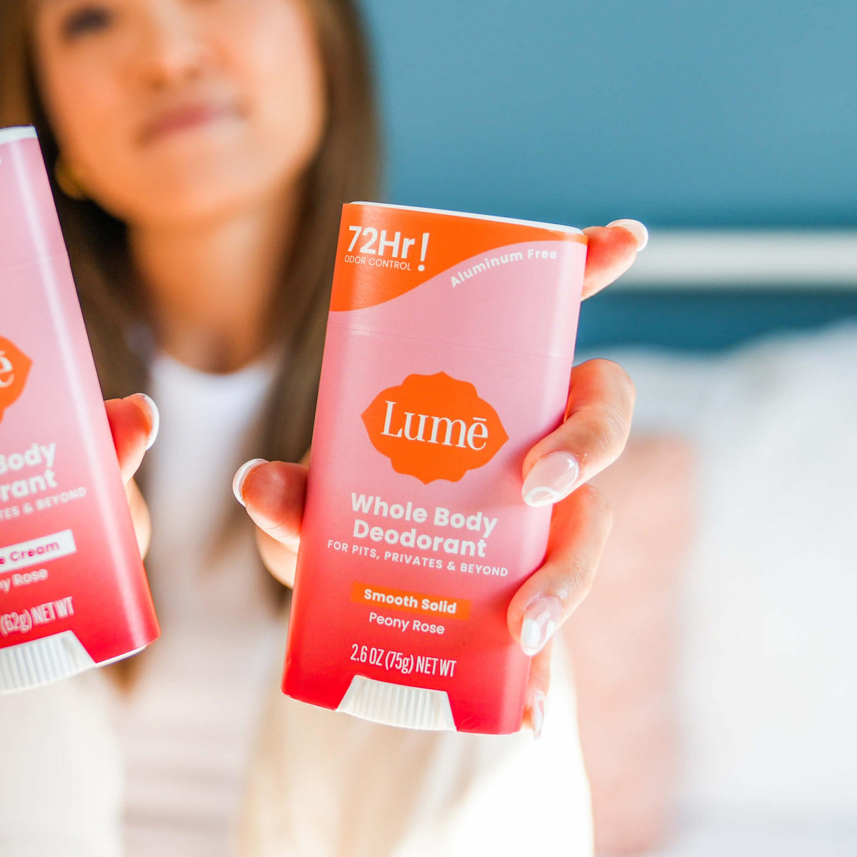 Lume applied underarm demonstrating whole-body use and fresh feeling benefit