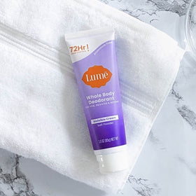 Lume on bathroom shelf lifestyle scene showing everyday grooming integration