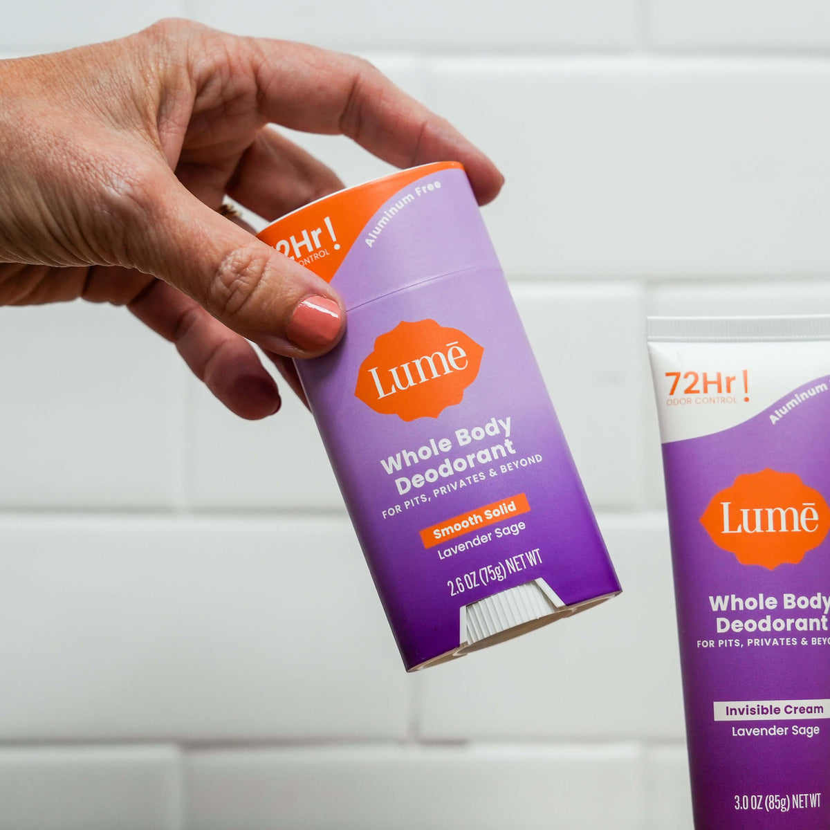Person applying Lume to underarm showing brand reducing body odor after use