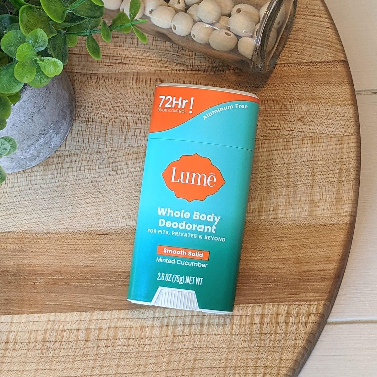 Person applying Lume to underarm demonstrating targeted odor protection and comfort