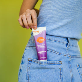 Applying Lume underarm demonstrating odor control for everyday confidence