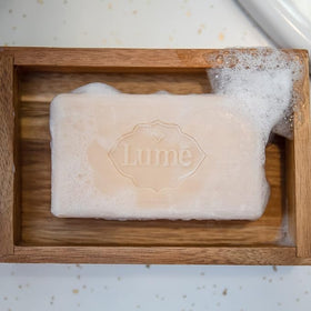 Lume shaving lather on skin demonstrating smooth shave benefit