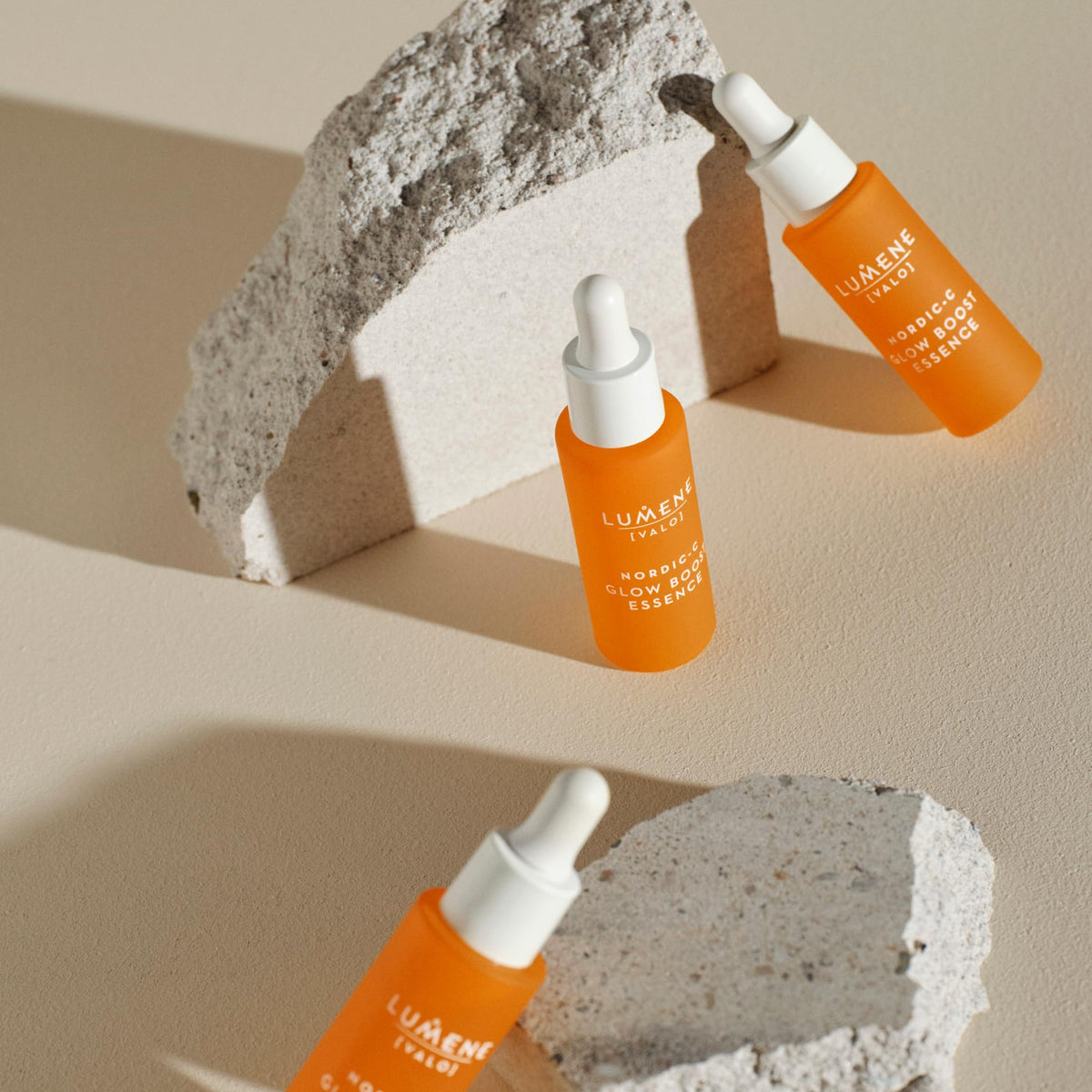 Lumene bottle on vanity staged with towel for everyday skincare routine