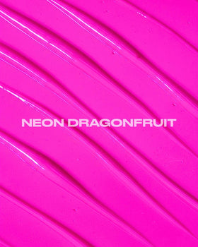 Festival hairstyle with Lunar Tides neon dragonfruit displaying bright pink UV-reactive color