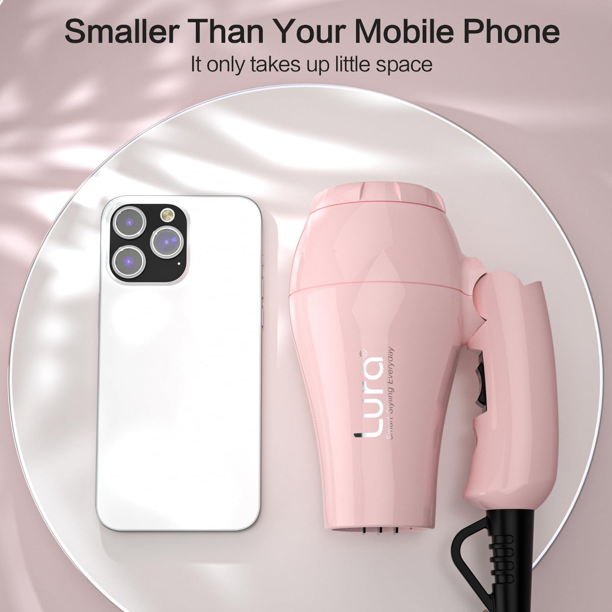 LURA next to smartphone demonstrating compact size and easy packing benefit